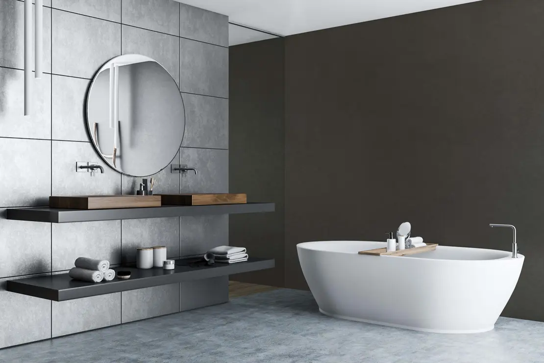 Baño con muros de microcemento de tonalidad gris oscuro. Baño con muros de microcemento de tonalidad gris oscuro.
